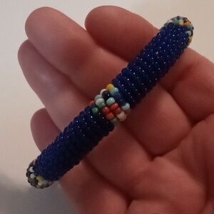#947  Blue Multi Colored Glass Seed Bead Bangle Bracelet. Size: 7